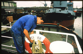 Durban, 1981. Shipwright working on SAR tug 'WM Clark' in Durban Harbour. [D Dannhauser]