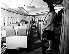 
SAA Boeing 747 interior. Cabin service. Hostess, cabin crew.
