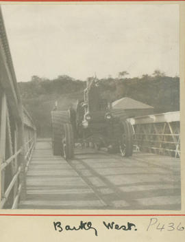 Barkly West, circa 1915. Tractor crossing the bridge over the Vaal River during World War One.