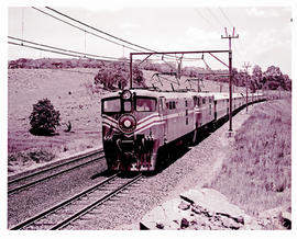 Johannesburg, 1968. Two SAR Class 5E1 Srs 2's with 2up Blue Train near Lawley.
