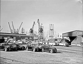 Port Elizabeth, 1948. Motor cars parked in Port Elizabeth harbour.