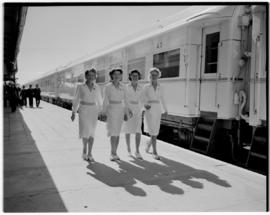 
Four women walking past the Royal Train.
