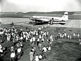Durban, 1962. Louis Botha airport. SAA Douglas DC-4 ZS-BMF 'Amatola'. Spectators watching.