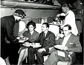 
SAA Douglas DC-4 Skycoach interior. Hostess and steward.
