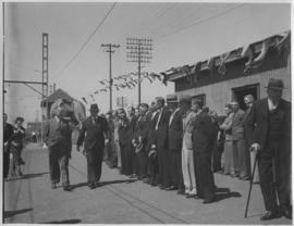 Durban, 1 December 1936. Arrival of first electric locomotive at Durban Platform 6. Line of men w...