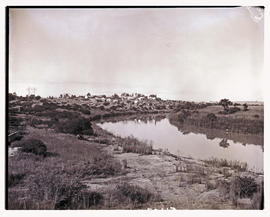Colenso, 1949. Settlement on river bank.