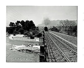Paarl district, 1945. Passenger train approaching railway bridge over the Berg River.