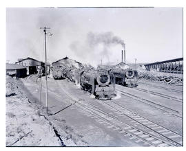 Kroonstad, 1940. Two SAR Class at locomotive depot.