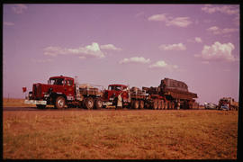 Two SAR trucks with heavy loads.