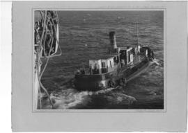 Durban Harbour, 15 February 1952. Tug "Koodoo" leaving "Stirling Castle".