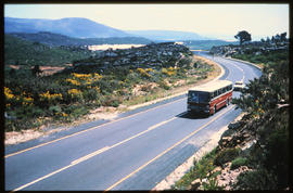 
SAR Mercedes Benz tour bus on the road.
