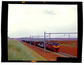 Bapsfontein, December 1982. Electric locomotive with goods train near Sentrarand. [T Robberts]