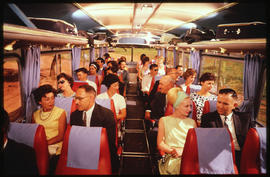 Interior of SAR tour bus with passengers.