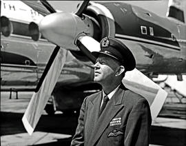 
Pilot standing next to engine and propeller of SAA Vickers Viscount.
