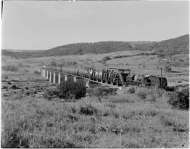 Natal, March 1947. Royal Train and Pilot Train pulled by SAR Class GEA Garratts on Tugela bridge.