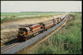 Komatipoort, 1986. SAR Class 37-000 No 37-001 in cutting with test train.