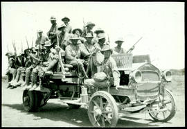 Armed men on Albion truck.