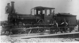 Kimberley district. CGR 1st Class No 19, later SAR Class 01, with staff. First locomotive to cros...