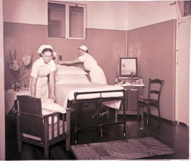 Springs, 1940. Nurses preparing hospital room.