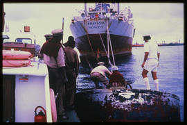 Durban, 1978. Harbour launch with berthing party in Durban Harbour.