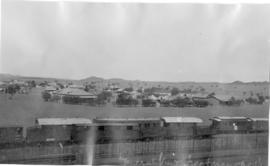 Keetmanshoop, South-West Africa, 1914/15. Odd assortment of 3'-6" rolling stock in foregroun...