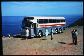 
SAR Silver Eagle tour bus at lookout point over ocean.

