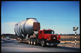 
SAR Mack truck No MT18860 hauling large tank. .
