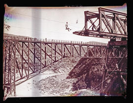 "Mossel Bay district, 1930. Construction of Gourits River bridge. Men returning to bank afte...