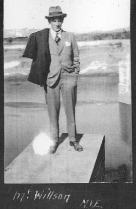 Circa 1925. Mr Willson posing on what appears to be a bridge pier. (Album on Natal electrification)