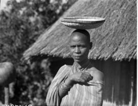 Tzaneen district, 1951. Woman in village.