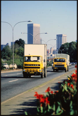 Johannesburg, 1989. SAR Leyland and International trucks with Fastfreight containers on city stre...