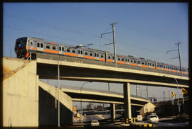 Johannesburg, 1984. SAR type 6M suburban train on George Goch flyover.