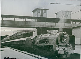 Johannesburg, 1951. SAR Class 15F with Blue Train leaving.