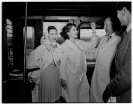 Swellendam, 22 February 1947. Princess Elizabeth sounds the whistle on footplate of SAR Class GEA...