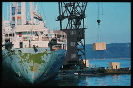 Durban, July 1974. Loading wooden crates in Durban Harbour. [S Mathyssen]