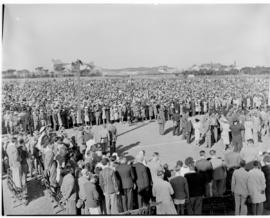 East London, 1 March 1947. Crowd awaiting in a field for Royal family arrival.