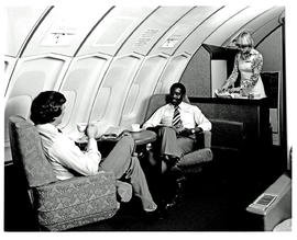 
SAA Boeing 747 interior. Cabin service. Hostess. Lounge.
