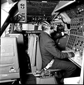 
Cockpit of SAA Boeing 747 ZS-SAN 'Lebombo'. Captain Billy van Rensburg in background.

