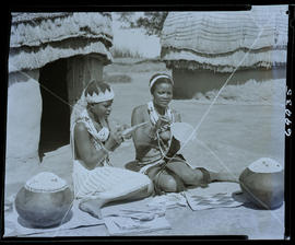 Zululand, 1961. Two Zulu women threading beads.