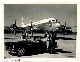 Port Elizabeth, 1955. SAA Douglas DC-7B ZS-DKD 'Dromedaris' with Ford Thunderbird.