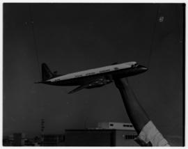 May 1963. Suspended model of Vickers Viscount being photographed.