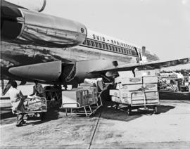 Durban, 1965. Louis Botha airport. SAA Boeing 727 ZS-DYO 'Vaal' with cargo of National Panasonic ...