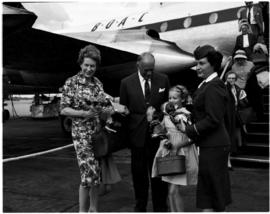 December 1958. Family with hostess outside BOAC Bristol Britannia aircraft.