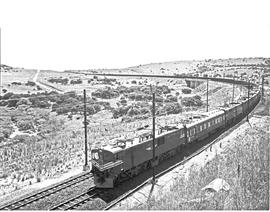 Vryheid district, 1979. SAR Class 7E Srs 1 with seven locomotives and dynamometer car on coal tes...