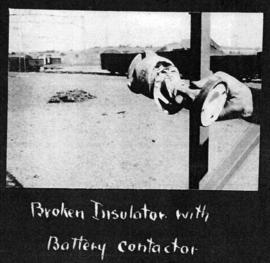 Circa 1925. Broken insulator with battery contactor. (Album on Natal electrification)