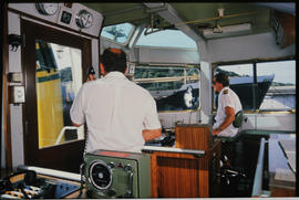 Port Elizabeth, March 1986. Crew at the controls of a tug. [T Robberts]
