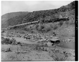 Alicedale district, 28 February 1947. SAR Class 19D's Nos. 2768 and 2750 pulling Pilot Train thro...