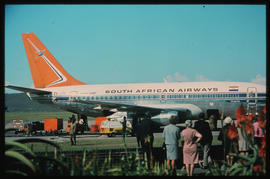 Durban, July 1970. Louis Botha Airport. Arrival of passengers for the Durban July horse race with...