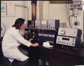 August 1978. Chemist measuring trace elements on atomic absorption spectrophotometer. [V Gilroy]