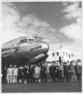 Group of people posing at SAA Douglas DC-4 ZS-AUA 'Tafelberg'.